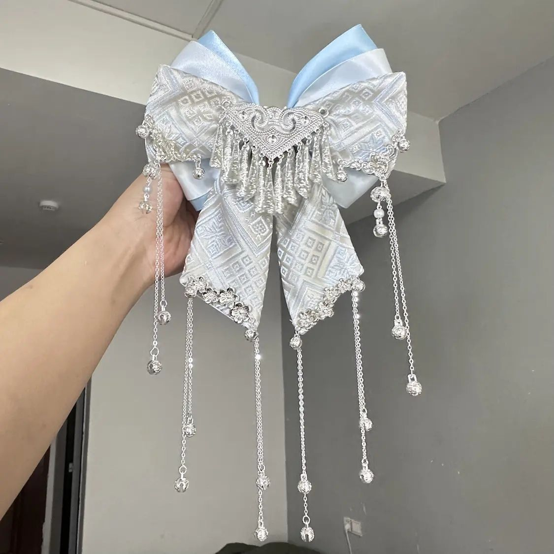 Blue DIY Hanfu-inspired brocade bow hair accessory with silver bells and tassels