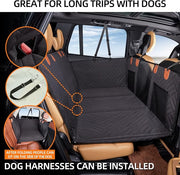 Truck dog backseat extender with seat belt access and foldable passenger section