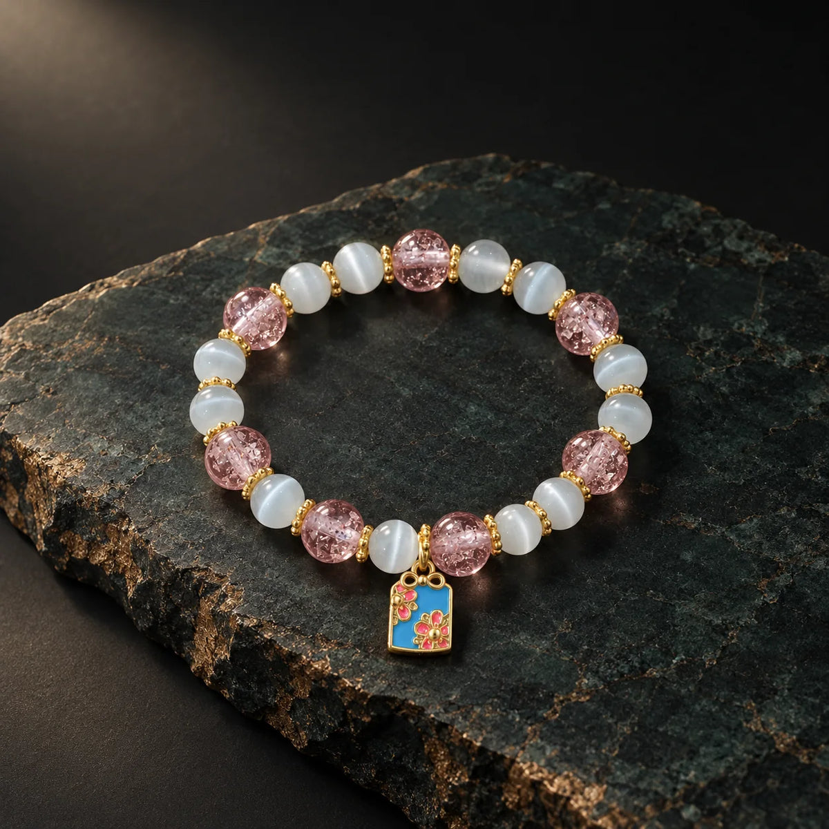 First Bloom bracelet with blue enamel floral tag