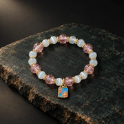 First Bloom bracelet with blue enamel floral tag