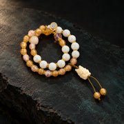 Golden Vigil guardian motif double-wrap bracelet