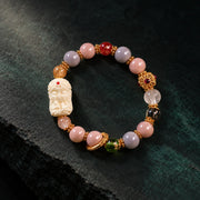 Still Mind symbolic bracelet on dark mineral stone