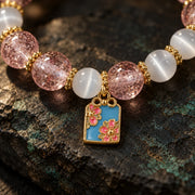 First Bloom bracelet floral tag close-up