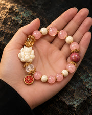 Rose Dawn bracelet presented in an open palm