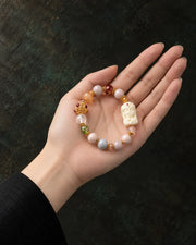 Still Mind bracelet presented in an open palm